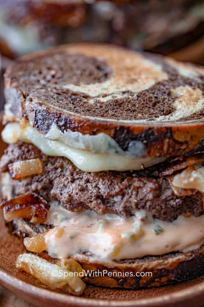 Homemade patty melts with onions and cheese