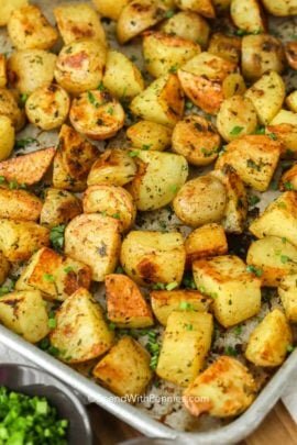 Baking sheet full of Oven Roasted Potatoes