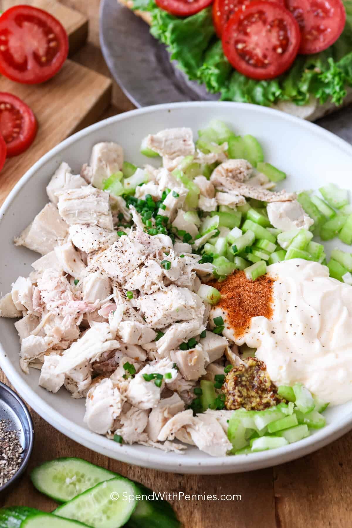 Ingredients ready to mix for a classic chicken salad recipe