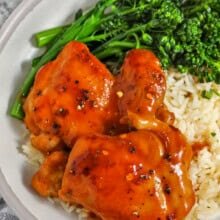 close up of Apricot Chicken on a plate with rice